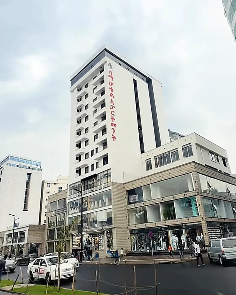 The Bama Hotel and Apartment tower on a street corner in Addis Ababa