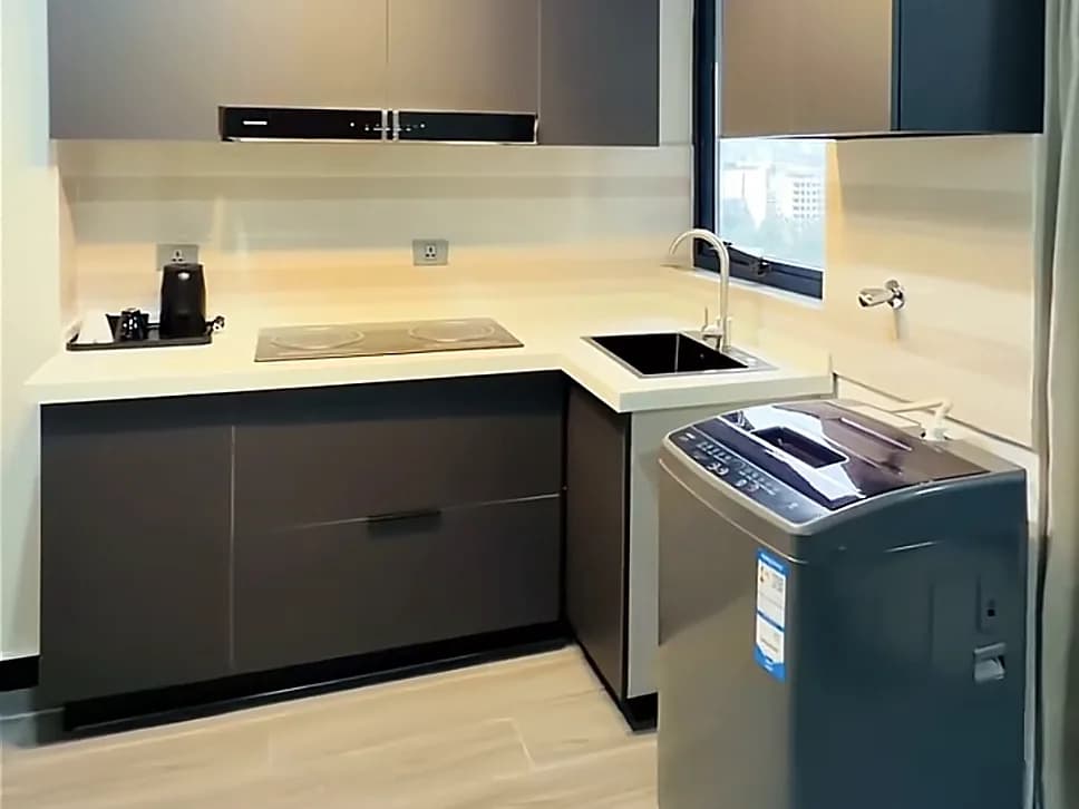 Kitchen with induction hob and washing machine
