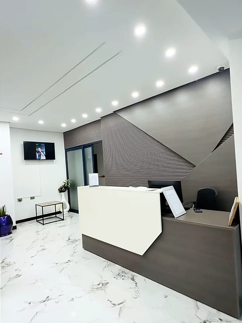 Reception desk in the marble lobby